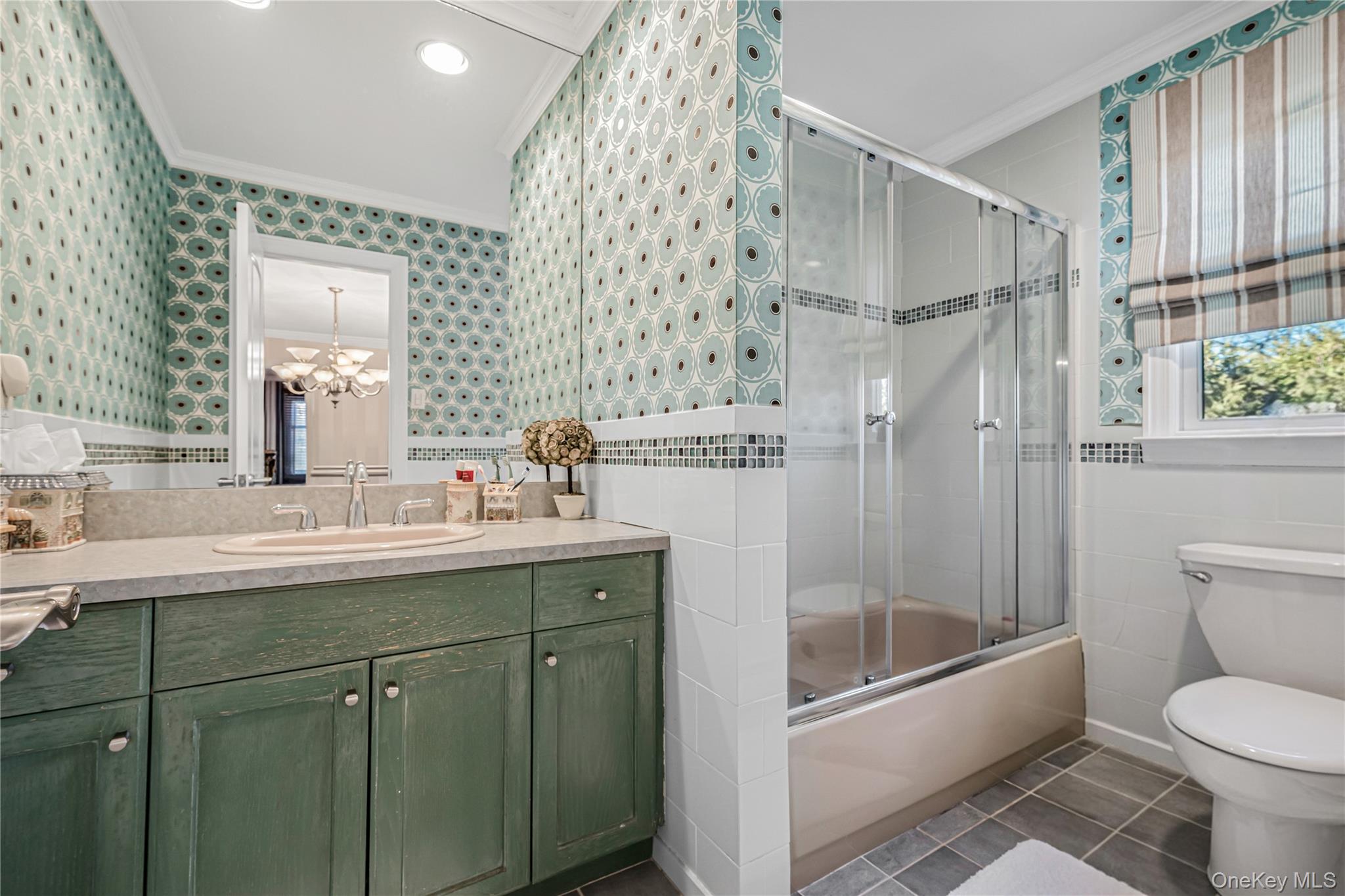 18 Woodland Road Roslyn, NY 11576 - Photo 11 of 21 a bathroom with a granite countertop sink toilet and shower