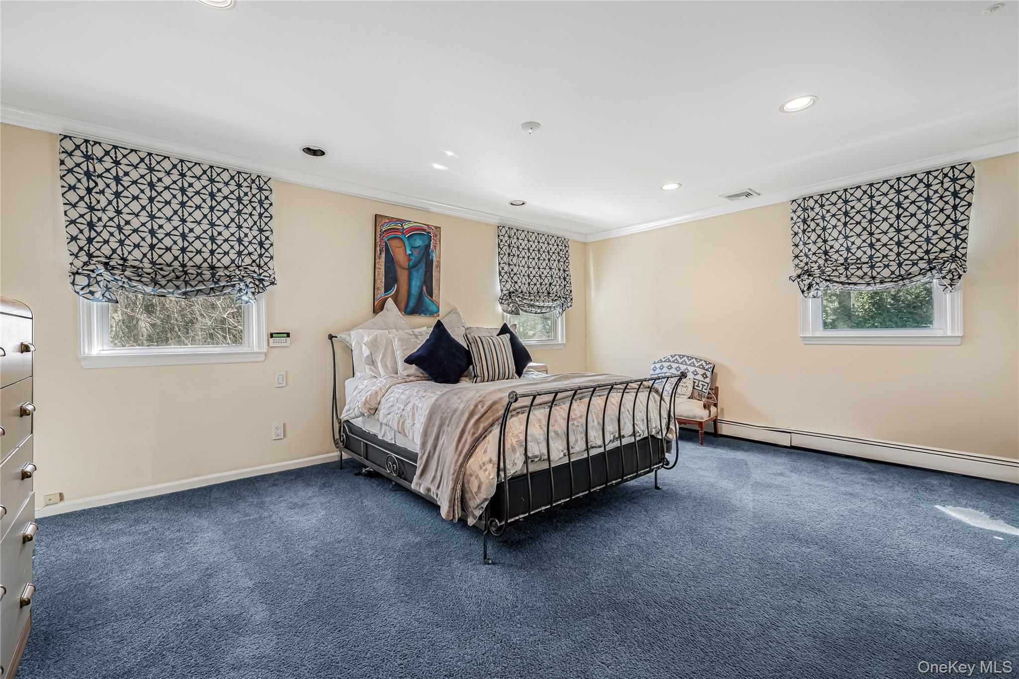 18 Woodland Road Roslyn, NY 11576 - Photo 13 of 21 a bedroom with a bed and window