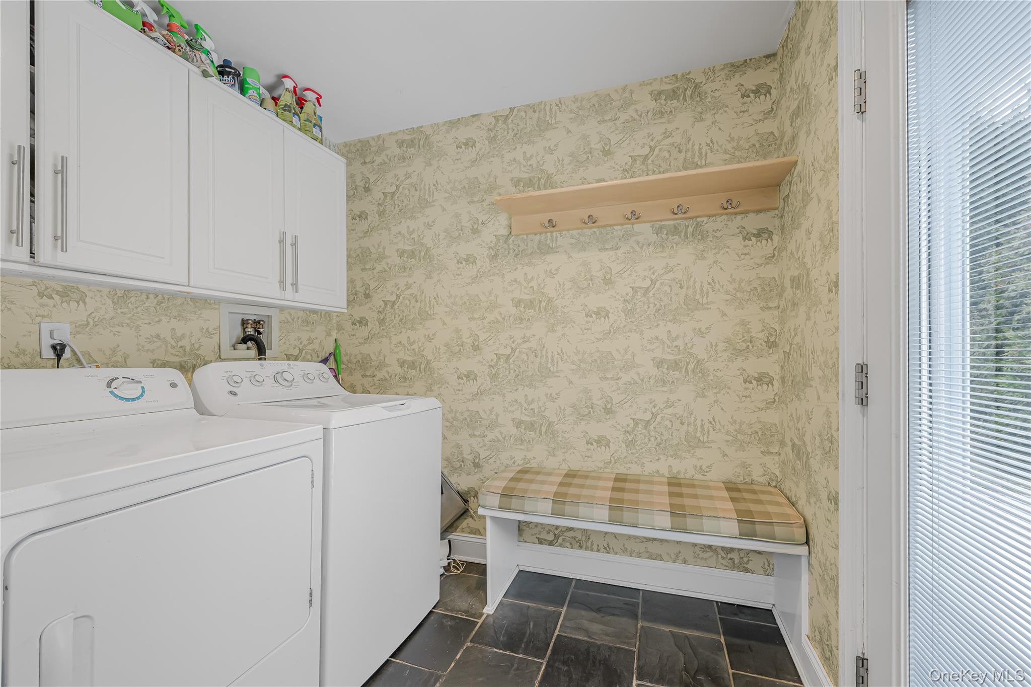 18 Woodland Road Roslyn, NY 11576 - Photo 17 of 21 a bathroom with a sink and a shower