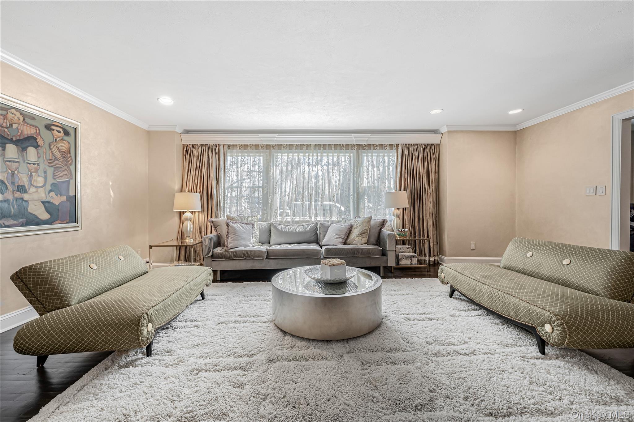 18 Woodland Road Roslyn, NY 11576 - Photo 3 of 21 a living room with furniture and a large window