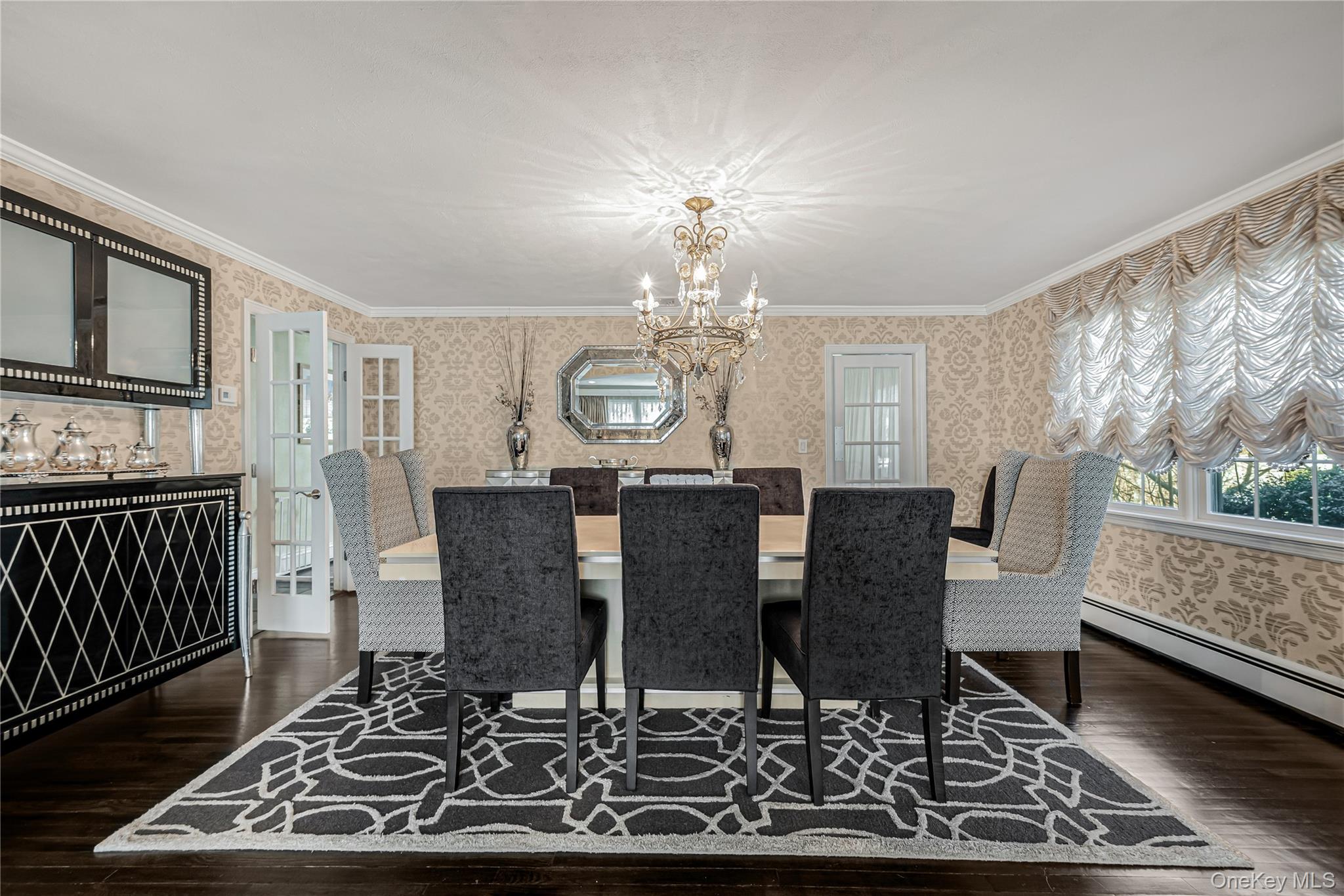 18 Woodland Road Roslyn, NY 11576 - Photo 4 of 21 a view of a dining room with furniture