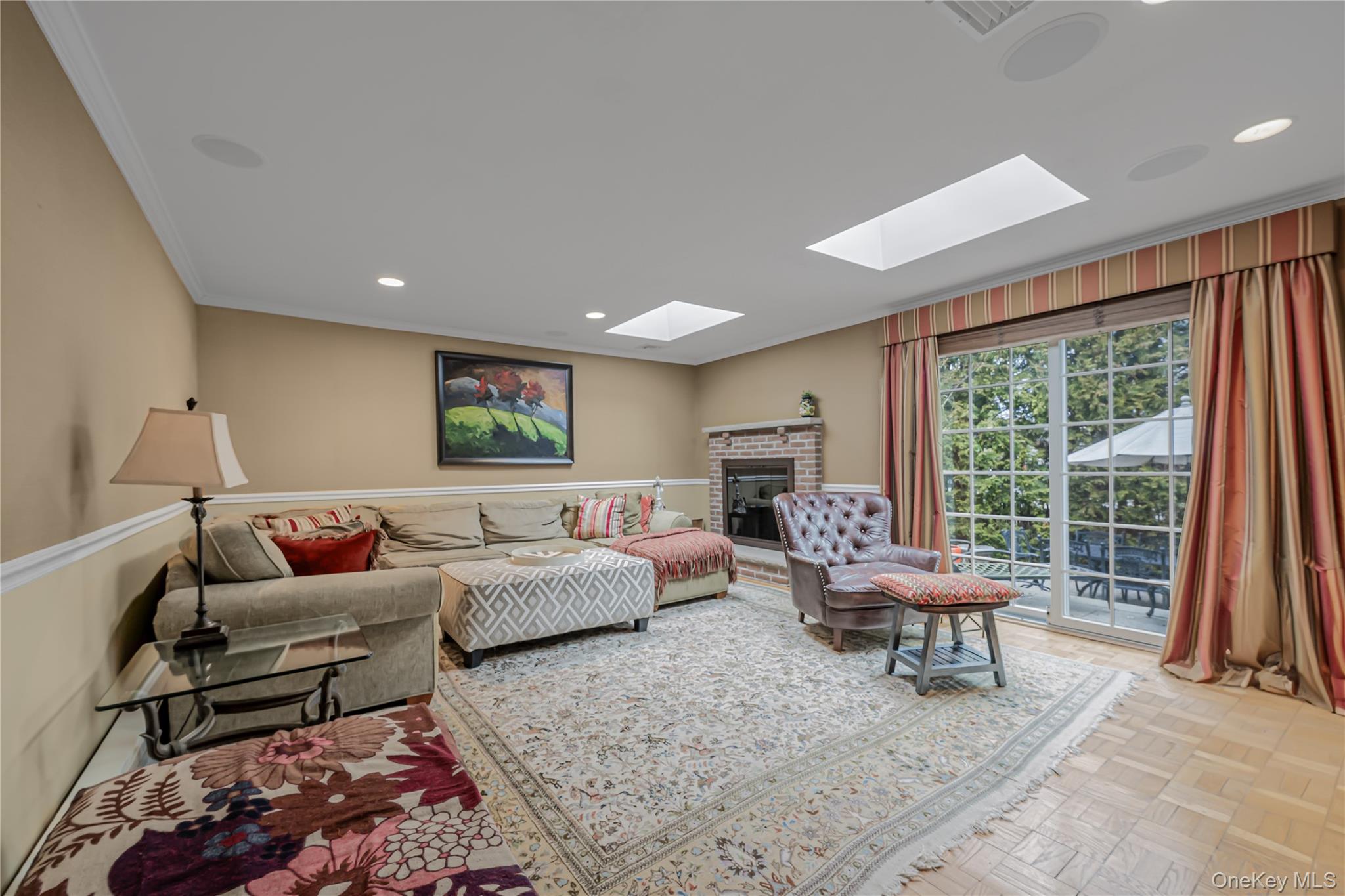 18 Woodland Road Roslyn, NY 11576 - Photo 7 of 21 a living room with furniture and a large window