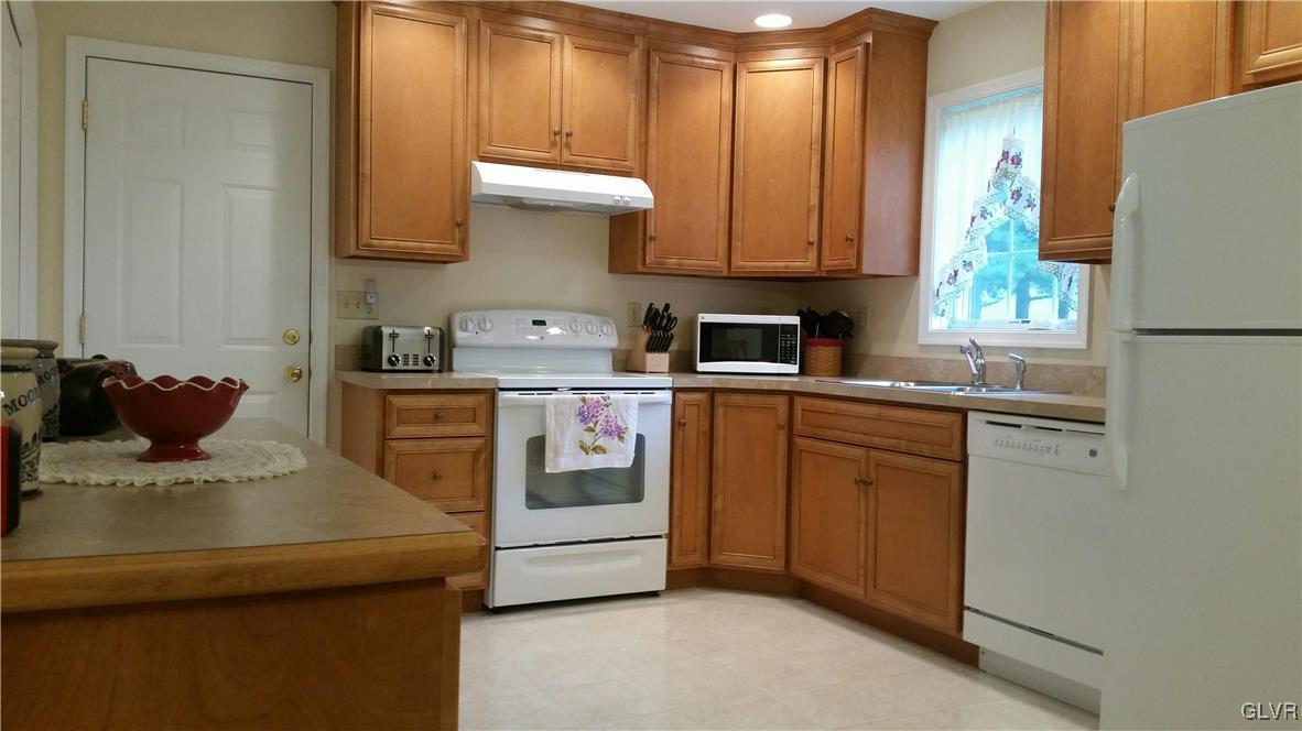 889 North Summit Road Bath, PA 18014 - Photo 3 of 6 a kitchen with a sink cabinets and appliances