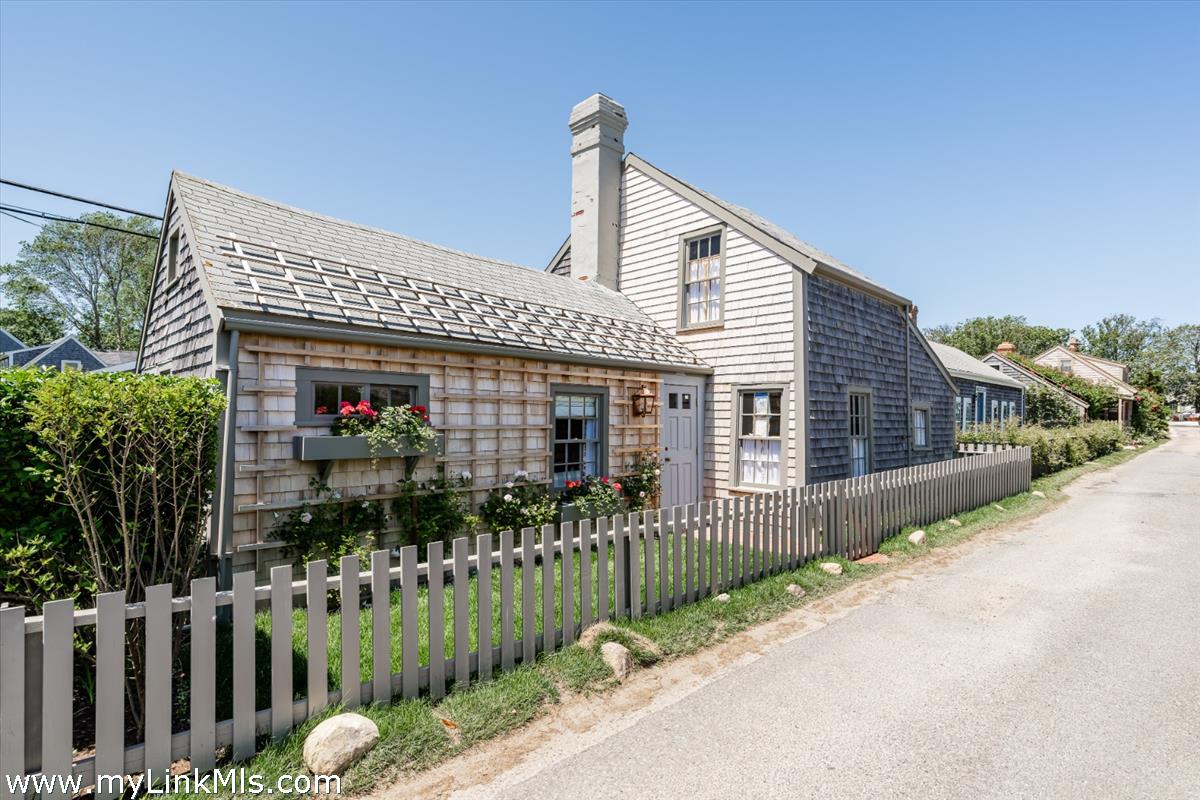 10 Centre Street Nantucket, MA 02554 - Photo 1 of 43 a front view of house along with street