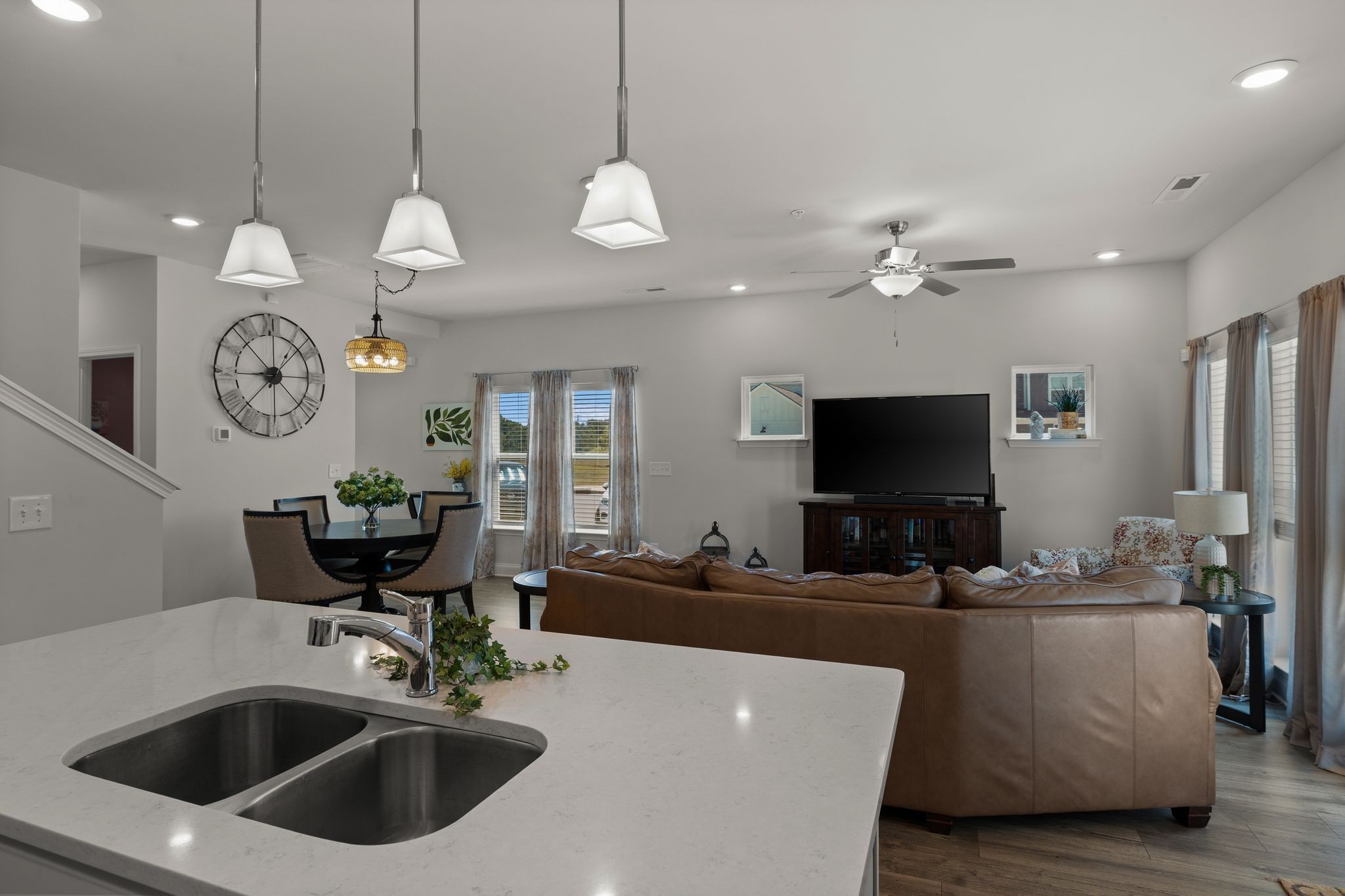 1247 June Wilde Ridge Spring Hill, TN 37174 - Photo 15 of 47 a living room with furniture kitchen view and a flat screen tv