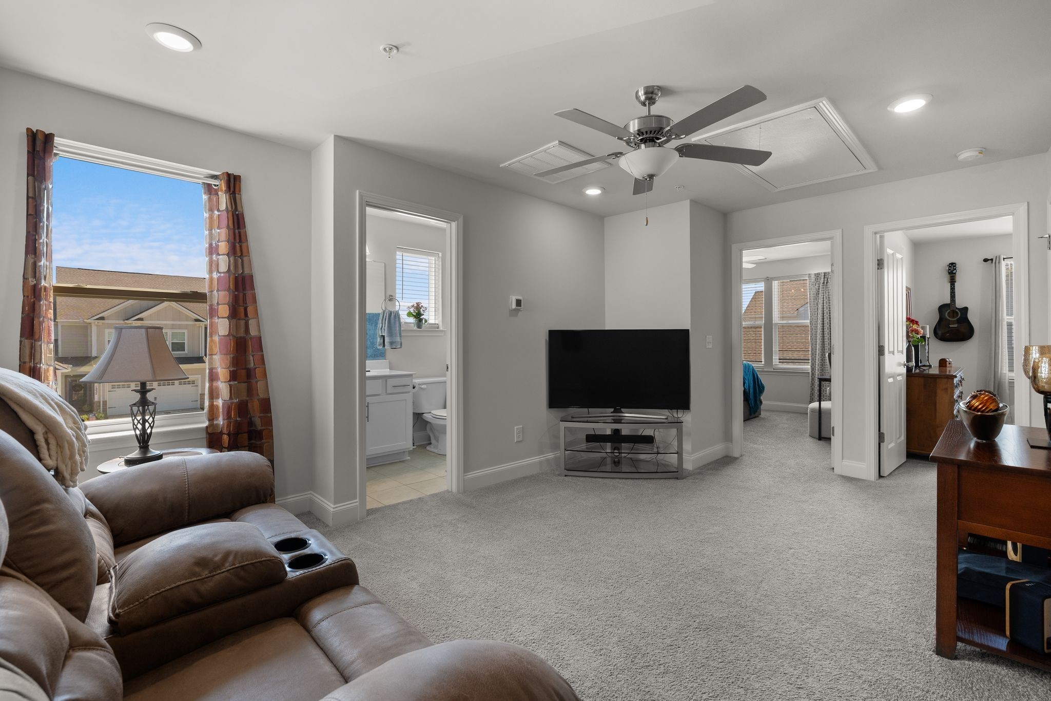 1247 June Wilde Ridge Spring Hill, TN 37174 - Photo 22 of 47 a living room with furniture and a flat screen tv