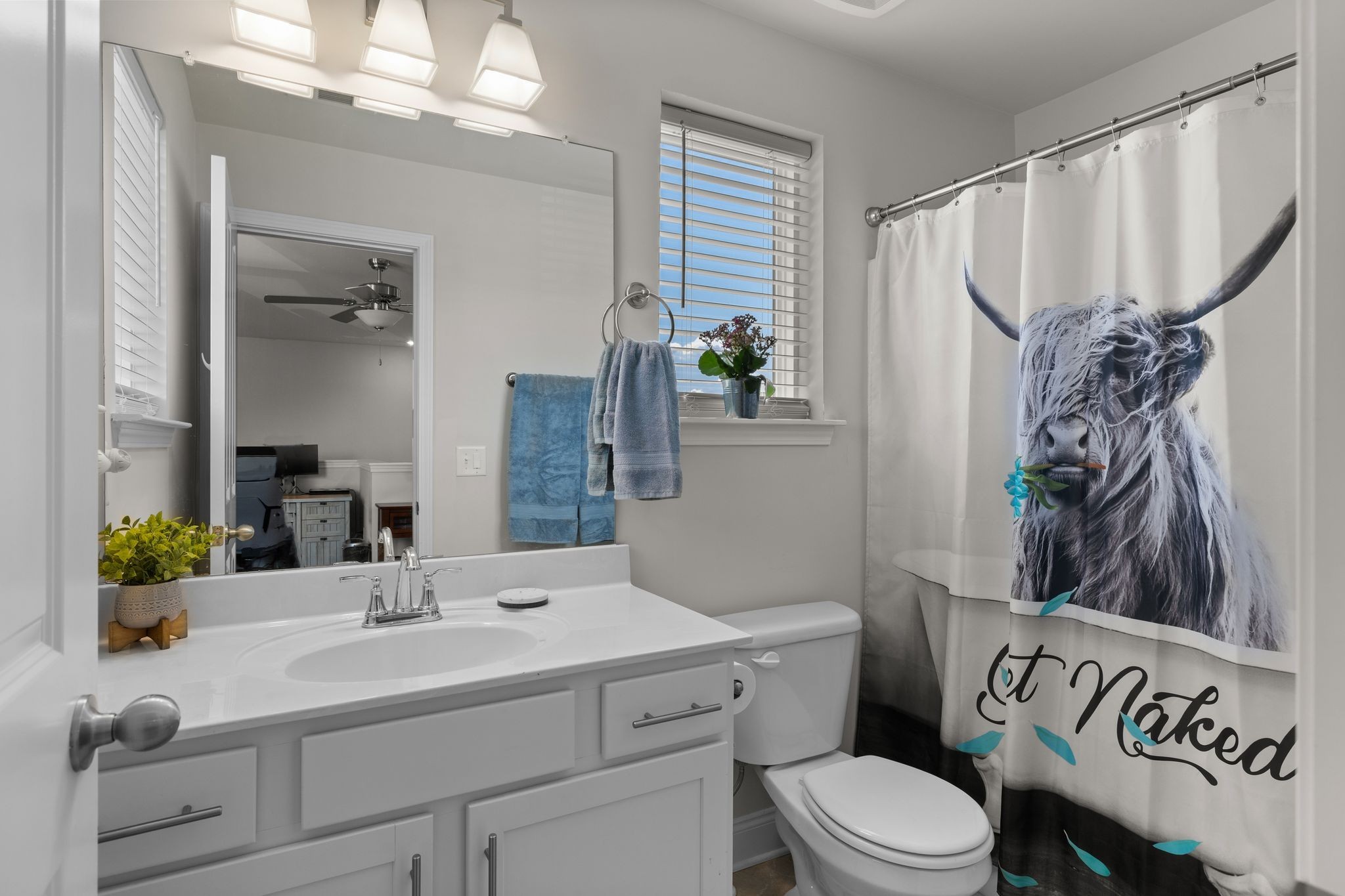 1247 June Wilde Ridge Spring Hill, TN 37174 - Photo 23 of 47 a bathroom with a sink a toilet and shower