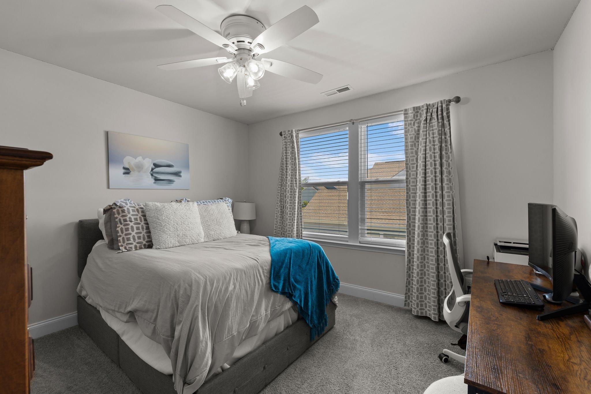 1247 June Wilde Ridge Spring Hill, TN 37174 - Photo 24 of 47 a bedroom with a bed and a chandelier