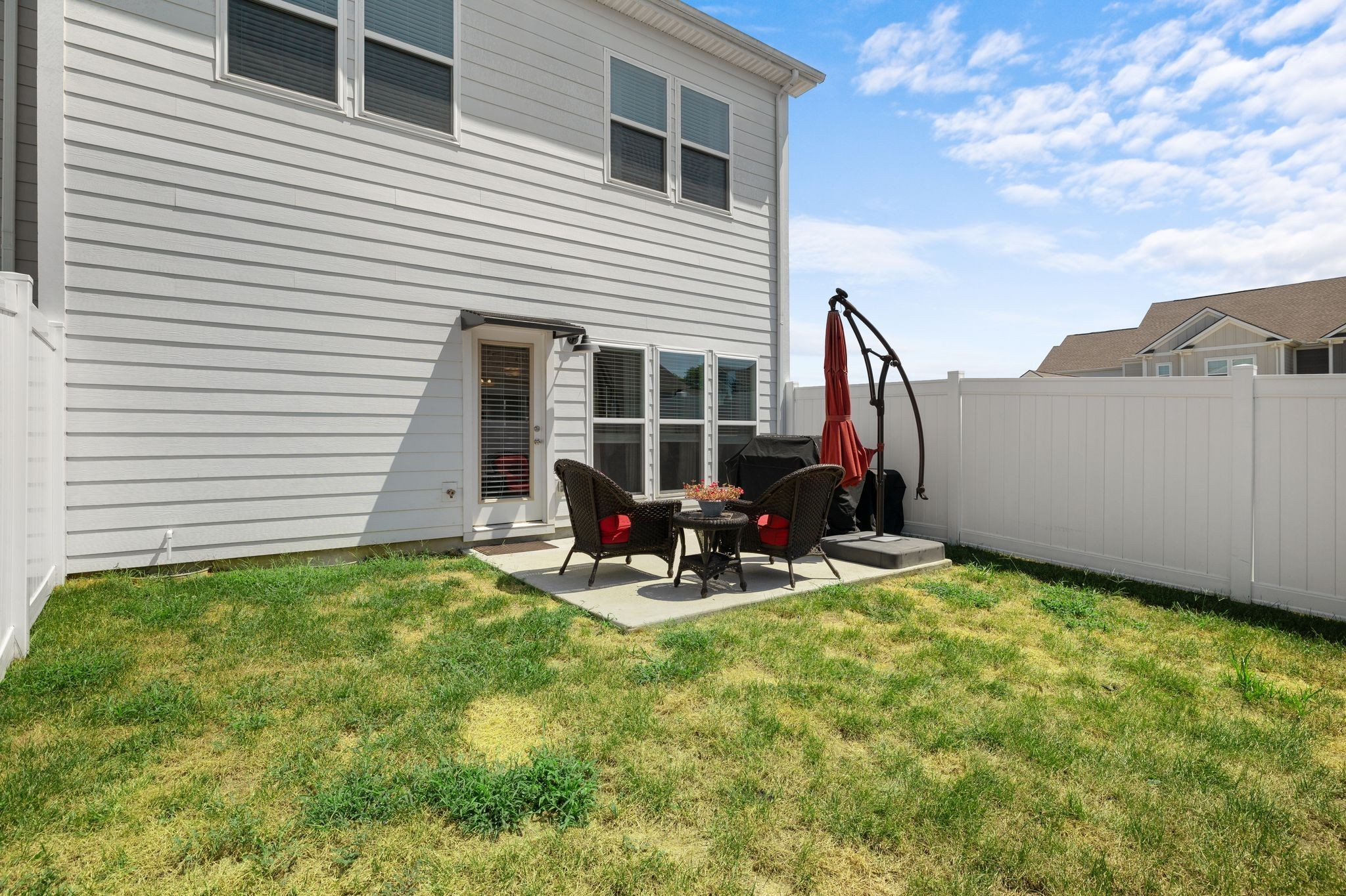 1247 June Wilde Ridge Spring Hill, TN 37174 - Photo 26 of 47 a view of a backyard with chair and deck