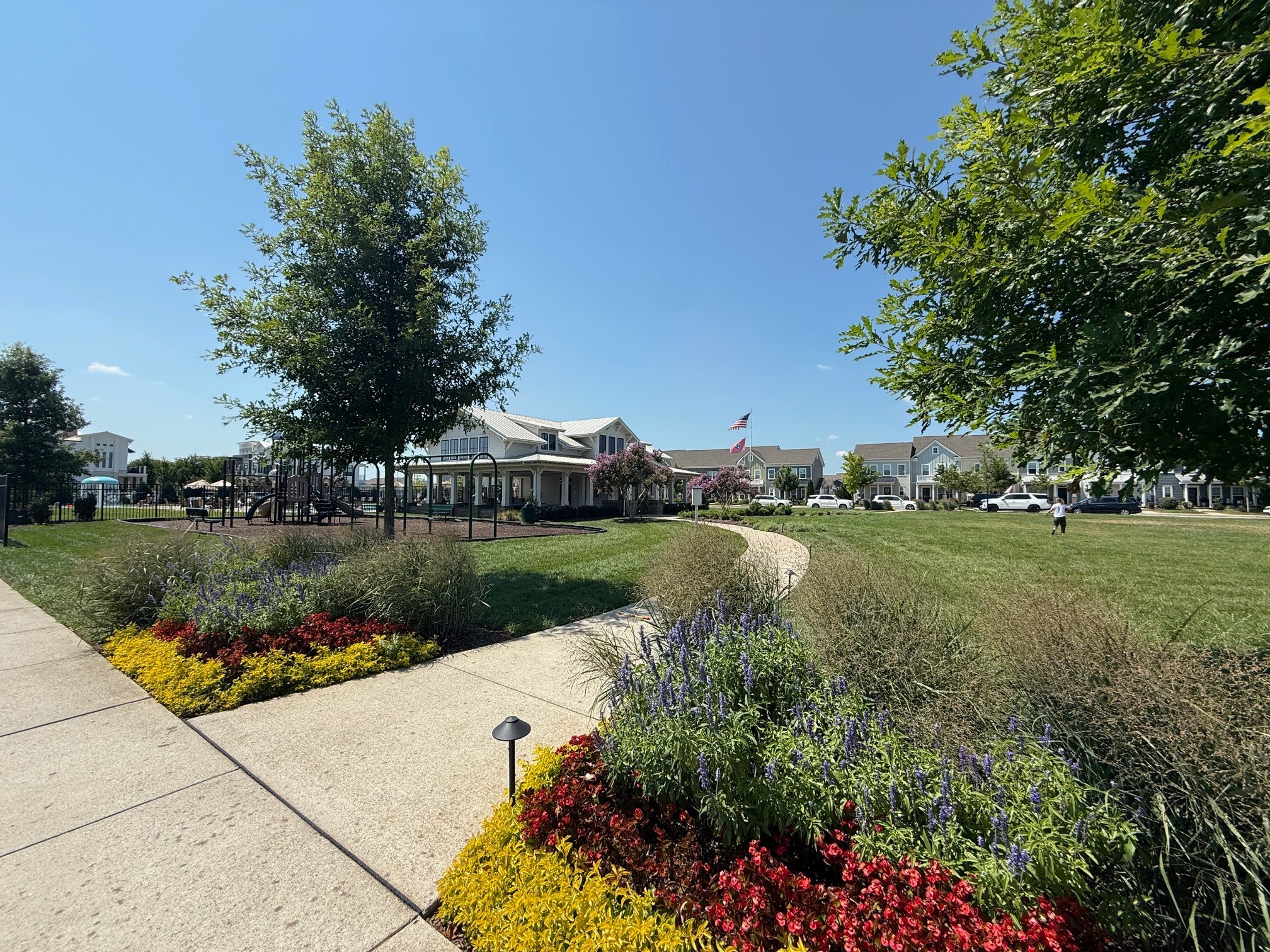 1247 June Wilde Ridge Spring Hill, TN 37174 - Photo 38 of 47 a view of a lake with a yard and potted plants