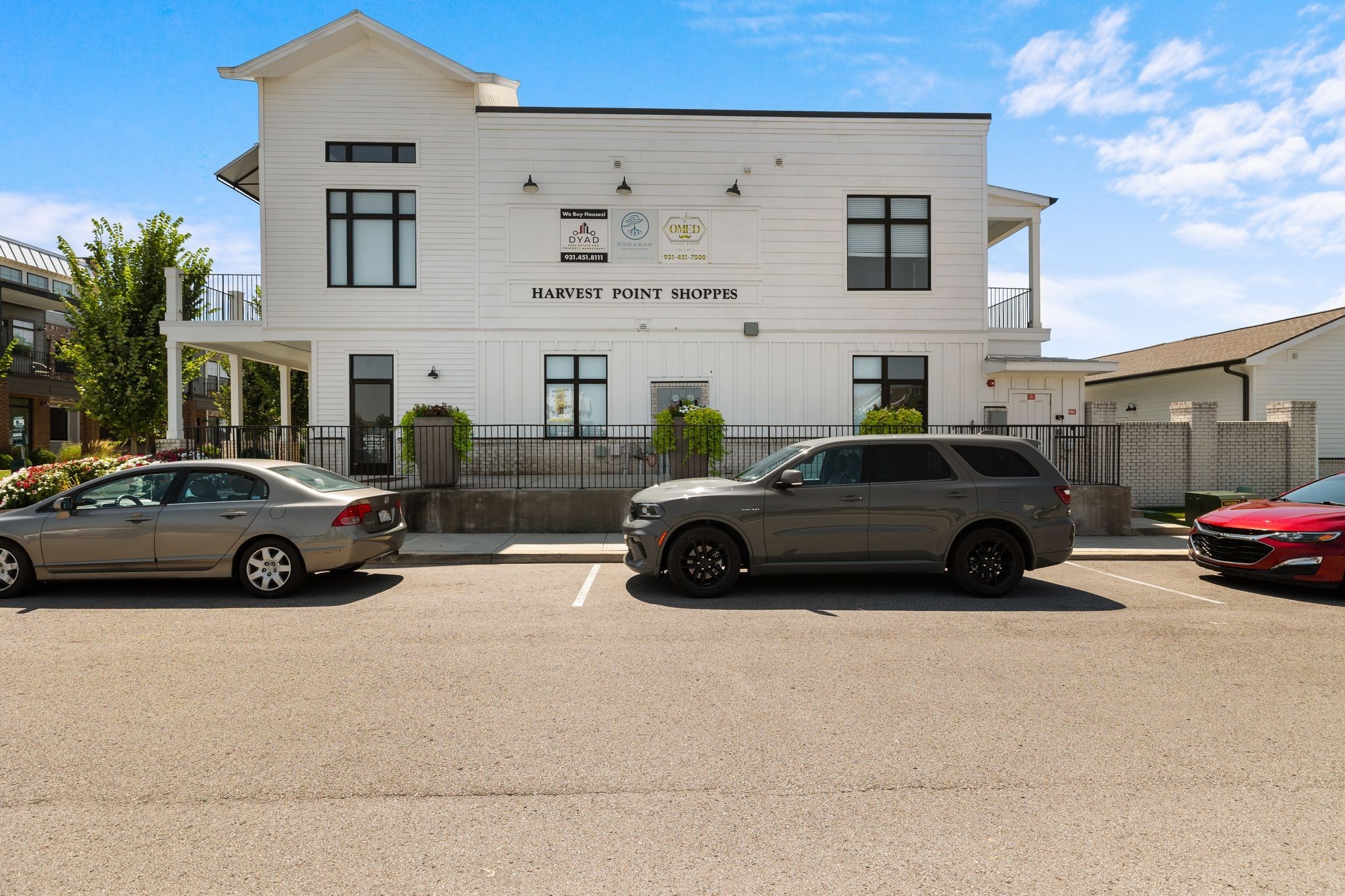 1247 June Wilde Ridge Spring Hill, TN 37174 - Photo 39 of 47 a view of cars parked in front of a building