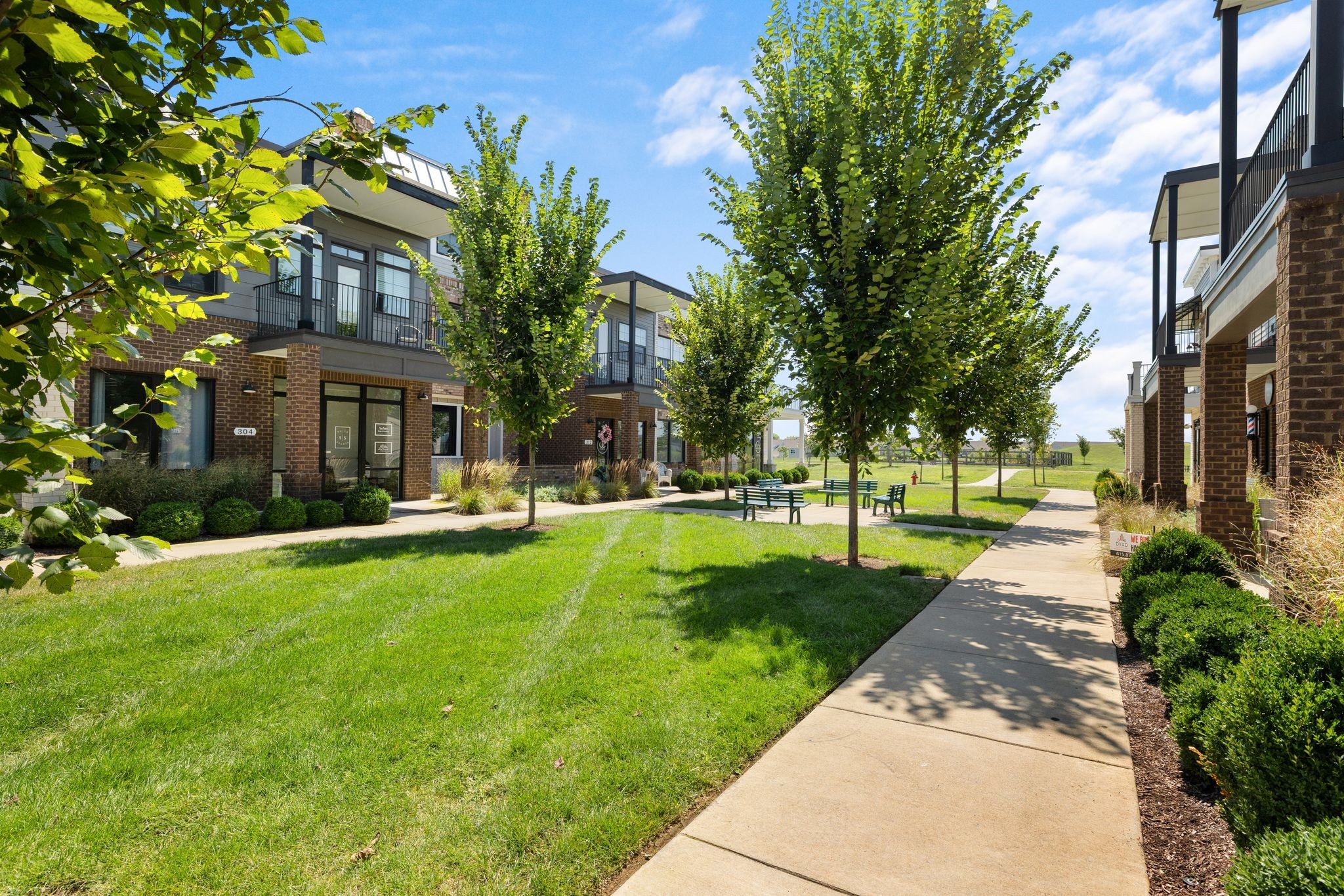 1247 June Wilde Ridge Spring Hill, TN 37174 - Photo 41 of 47 a view of a building with a yard