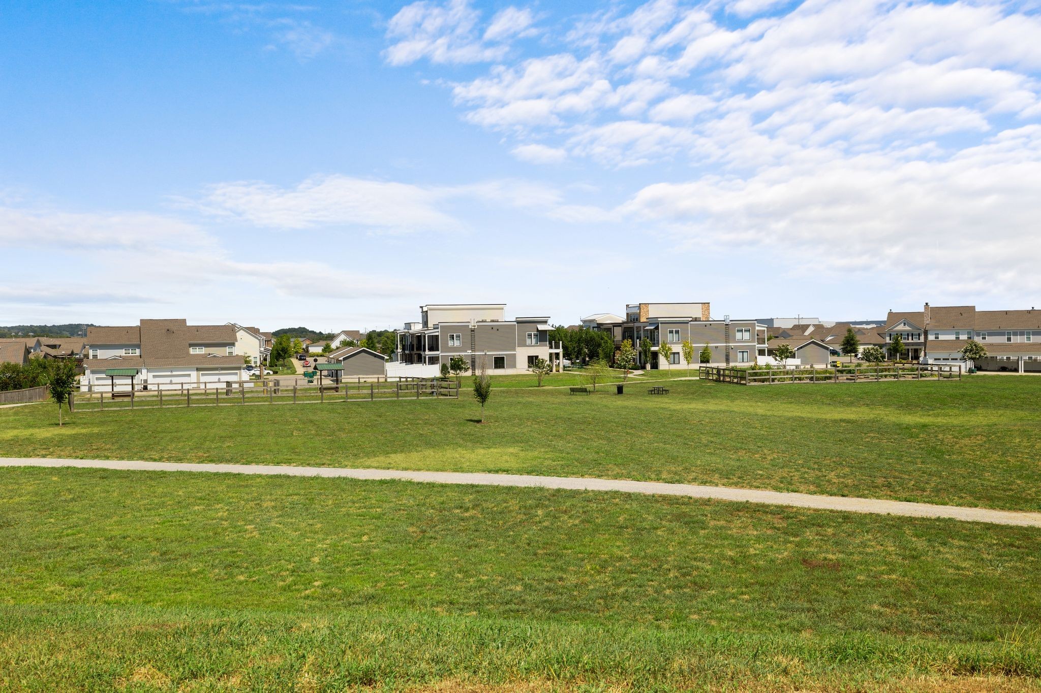 1247 June Wilde Ridge Spring Hill, TN 37174 - Photo 44 of 47 a view of a lake with a houses