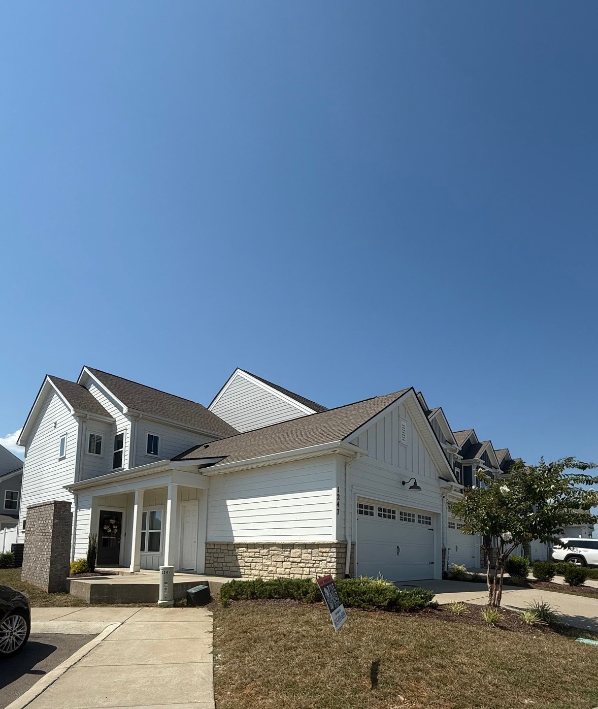 1247 June Wilde Ridge Spring Hill, TN 37174 - Photo 47 of 47 a front view of a house with a yard