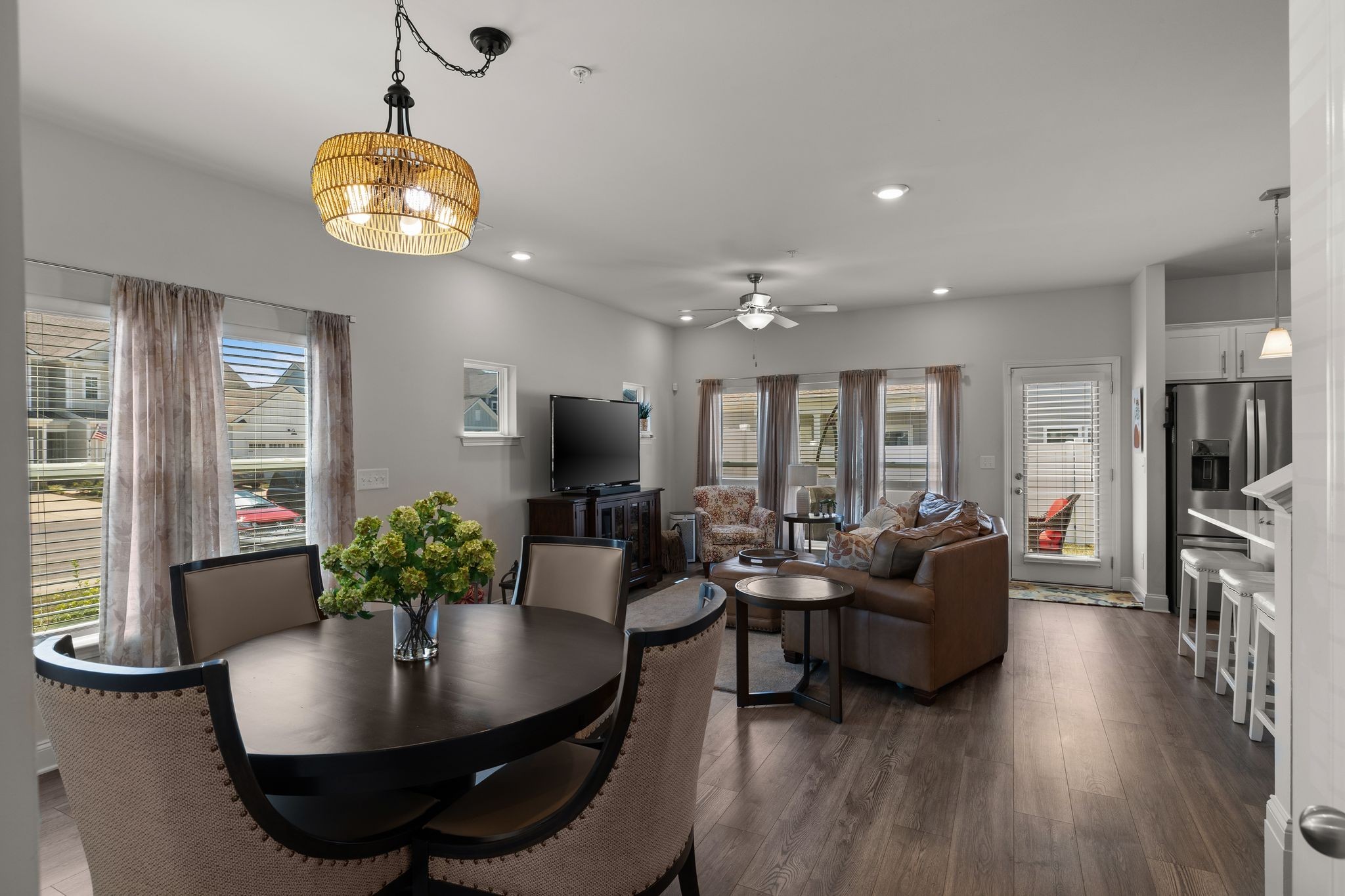 1247 June Wilde Ridge Spring Hill, TN 37174 - Photo 7 of 47 a living room with furniture kitchen and a chandelier
