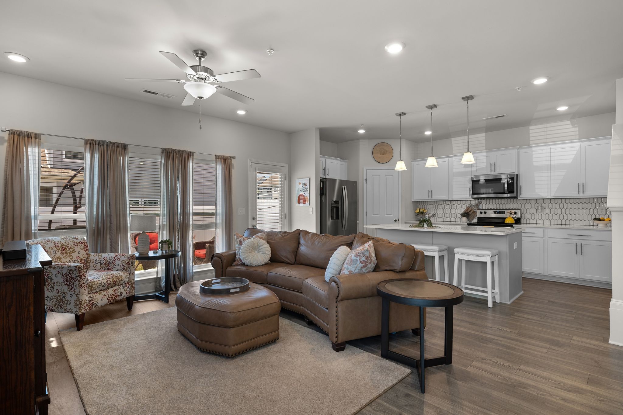 1247 June Wilde Ridge Spring Hill, TN 37174 - Photo 8 of 47 a living room with furniture and kitchen view