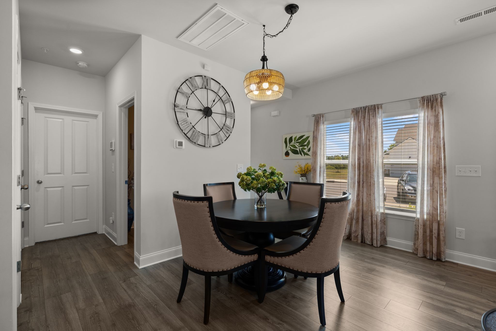 1247 June Wilde Ridge Spring Hill, TN 37174 - Photo 9 of 47 a view of a dining room with furniture window and wooden floor