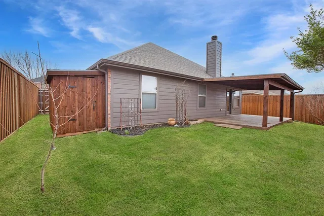 a view of hallway with wooden floor