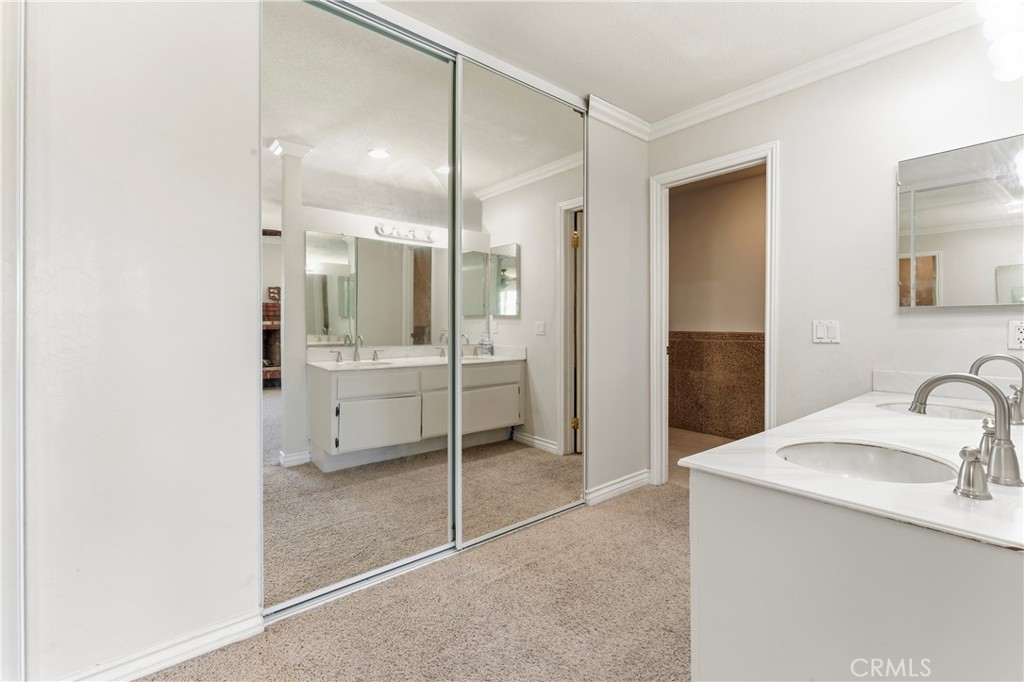 5259 Galloway Street Rancho Cucamonga, CA 91701 - Photo 27 of 34 Primary Bathroom -Dual Sinks and Mirrored Wardrobe Doors