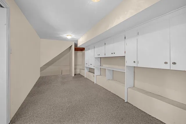 a backyard of a house with seating space