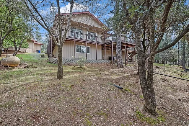 a big house with lots of trees