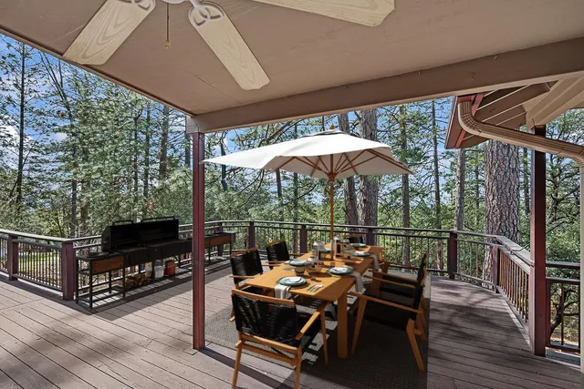 a balcony view with a seating space