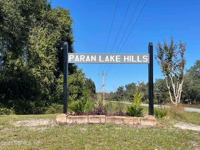 a view of swimming pool with a yard