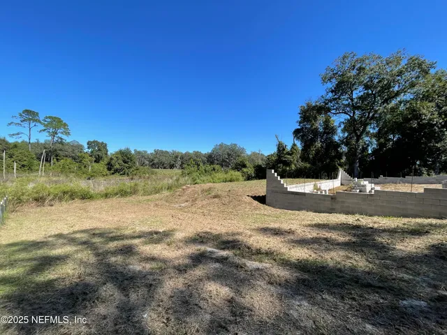 a view of lake view with mountain