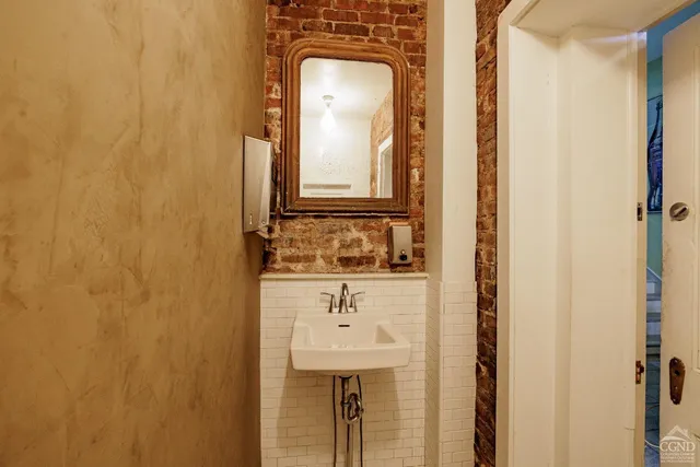a room with gym equipment and a mirror