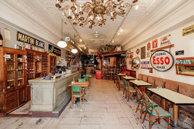 a group of chairs sitting in kitchen and dining room