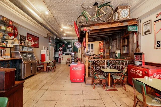 a group of people sitting in a living room