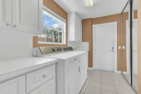 a view of a kitchen with cabinets