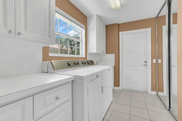 a view of a kitchen with cabinets