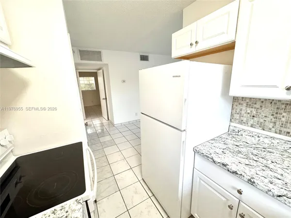 $1,850 | 4140 Woodside Drive, Unit 107, Coral Springs, FL 33065