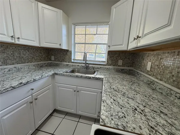 $1,850 | 4140 Woodside Drive, Unit 107, Coral Springs, FL 33065