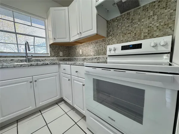 $1,850 | 4140 Woodside Drive, Unit 107, Coral Springs, FL 33065