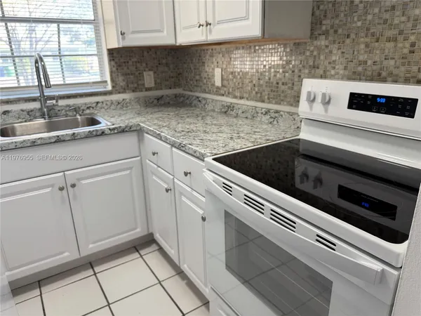 $1,850 | 4140 Woodside Drive, Unit 107, Coral Springs, FL 33065