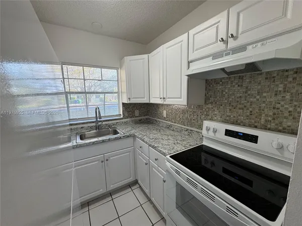 $1,850 | 4140 Woodside Drive, Unit 107, Coral Springs, FL 33065