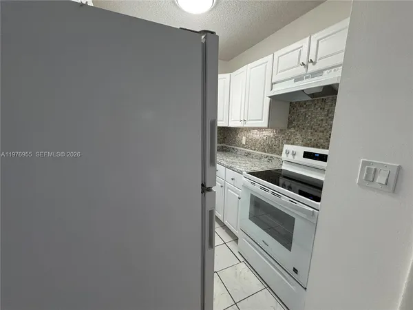 $1,850 | 4140 Woodside Drive, Unit 107, Coral Springs, FL 33065