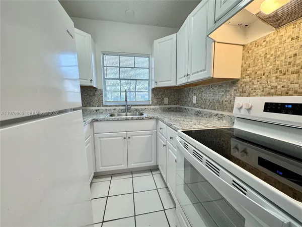 $1,850 | 4140 Woodside Drive, Unit 107, Coral Springs, FL 33065