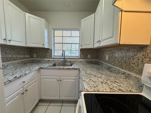 $1,850 | 4140 Woodside Drive, Unit 107, Coral Springs, FL 33065
