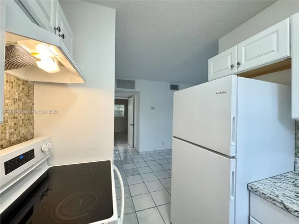 $1,850 | 4140 Woodside Drive, Unit 107, Coral Springs, FL 33065