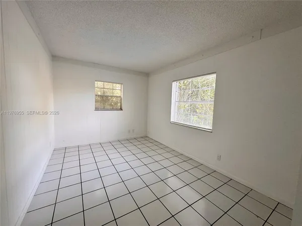 $1,850 | 4140 Woodside Drive, Unit 107, Coral Springs, FL 33065
