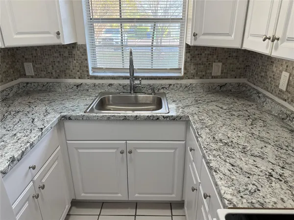 $1,850 | 4140 Woodside Drive, Unit 107, Coral Springs, FL 33065
