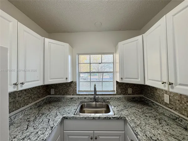 $1,850 | 4140 Woodside Drive, Unit 107, Coral Springs, FL 33065