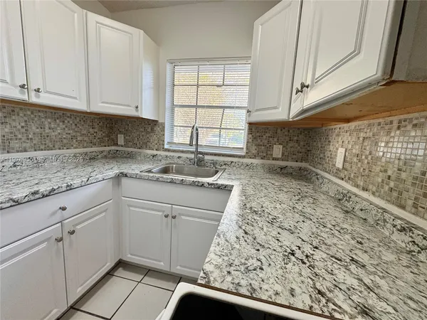 $1,850 | 4140 Woodside Drive, Unit 107, Coral Springs, FL 33065