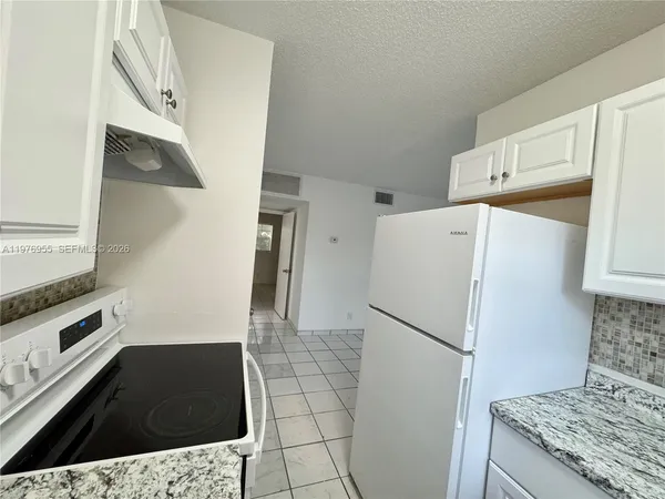 $1,850 | 4140 Woodside Drive, Unit 107, Coral Springs, FL 33065