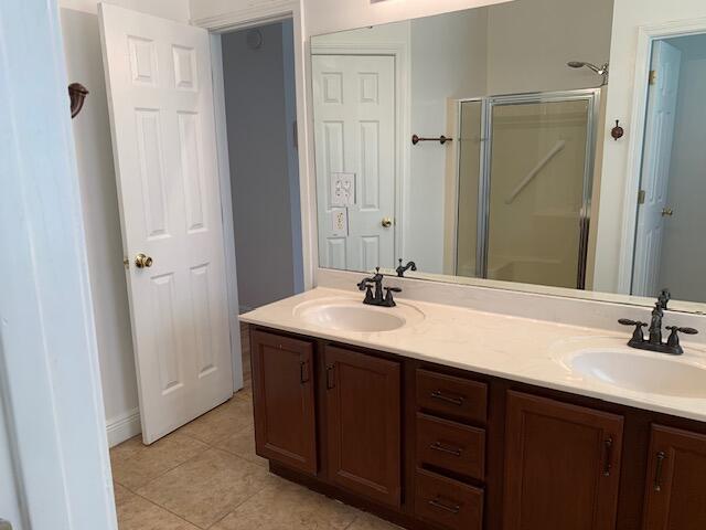 136 Gail La Rue Fort Walton Beach, FL 32547 - Photo 15 of 31 a bathroom with a double vanity sink and mirror