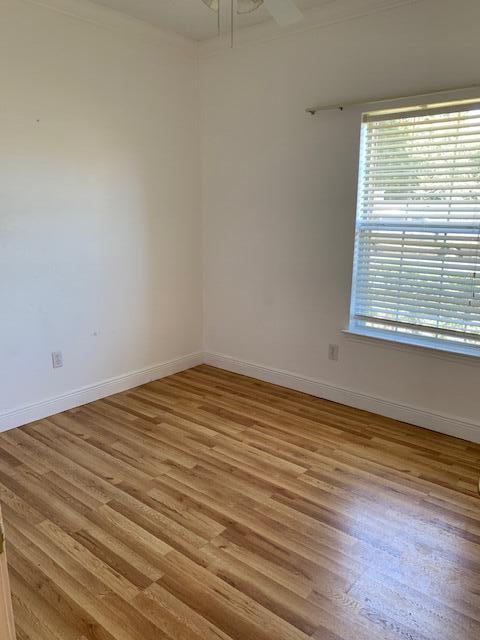 136 Gail La Rue Fort Walton Beach, FL 32547 - Photo 17 of 31 a view of empty room with wooden floor and fan