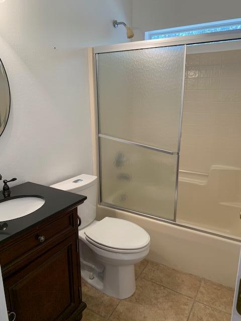 136 Gail La Rue Fort Walton Beach, FL 32547 - Photo 21 of 31 a bathroom with a granite countertop sink toilet and a shower